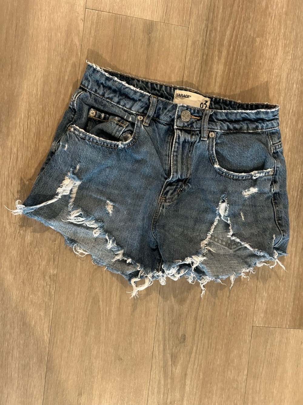 Garage Festival Distressed Light Blue Frayed Denim Shorts